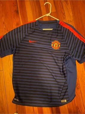 Nike Manchester United Navy & Black Striped Training Jersey with Red Accents